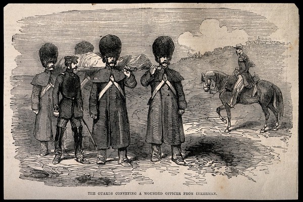 Crimean War: ambulance men carrying a wounded officer from Inkermann. Wood engraving.