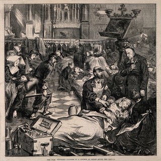 Franco-Prussian War: wounded soldiers being treated in a church in Sedan. Wood engraving by J. Swain after F. Barnard, 1870.