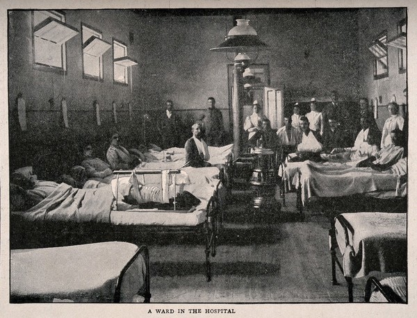 Boer War: a hospital ward with soldiers wounded during the siege of Kimberley, South Africa. Process print after Bennett, 1899.
