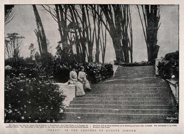 Boer War: two aristocratic ladies in the grounds of a large house used as a military hospital at Rondebosch, South Africa. Halftone, c. 1900, after Duffus Brothers.