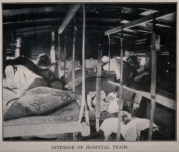 Boer War: wounded soldiers lying inside a hospital train. Halftone, c.1900.
