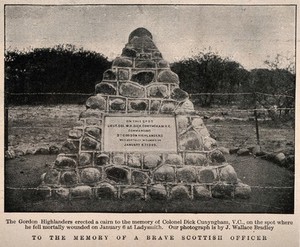 view Boer War: a cairn to the memory of Colonel Dick Cunyngham, V. C., at Ladysmith. Halftone, c. 1900, after a photograph by J. Wallace Bradley.