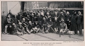 view Boer War: a group of wounded war veterans at the docks in England. Halftone, c. 1900, after a photograph.