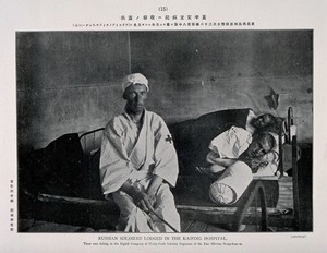 view Russo-Japanese War: three wounded Russian soldiers in the Kaiping hospital, two in bed. Collotype, c. 1904.