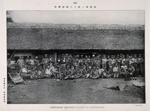 view Russo-Japanese War: rows of wounded soldiers in a temporary dressing station at Hsuchiakou, China. Collotype, c. 1904.