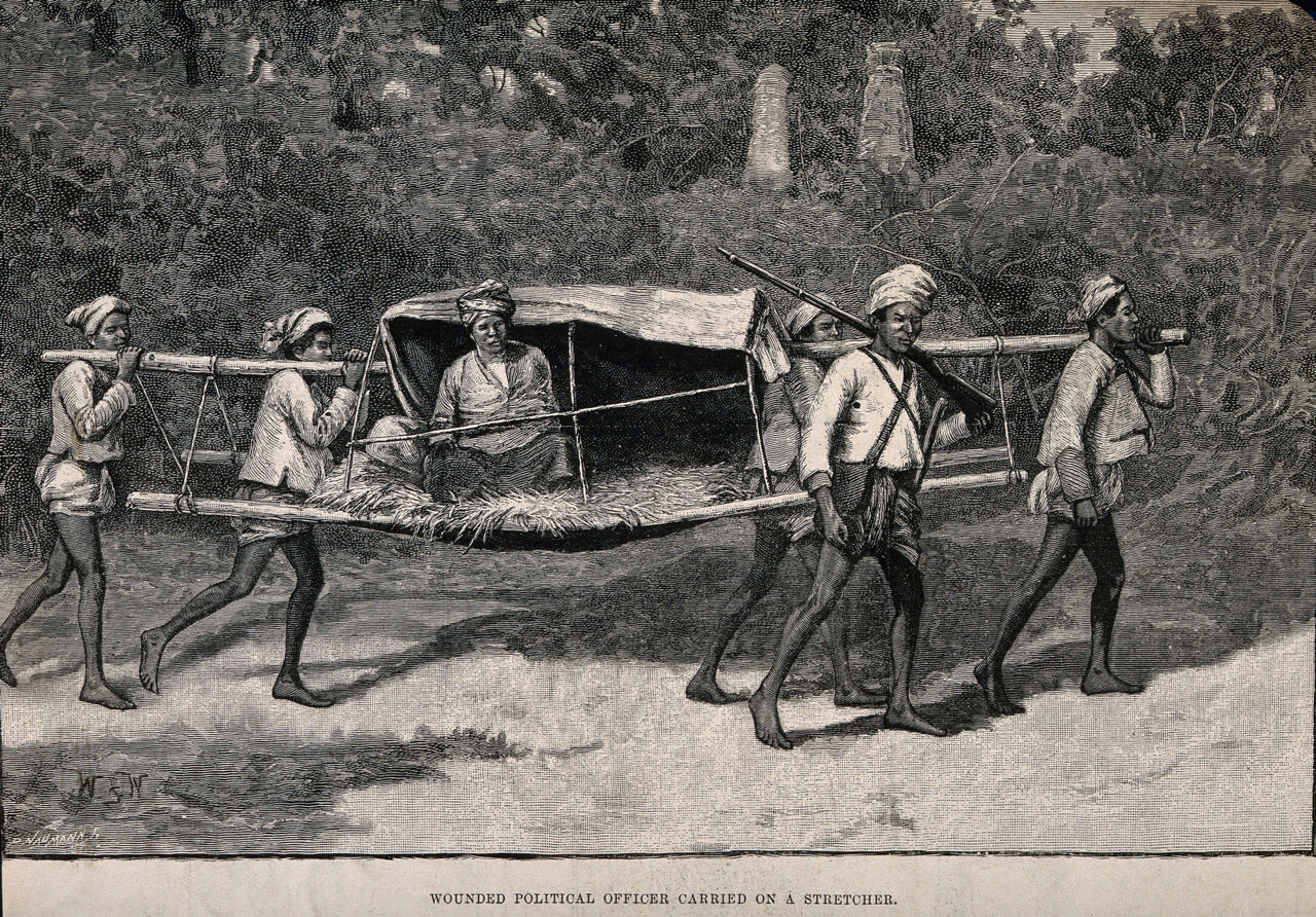 Burma: a wounded political officer being carried on a stretcher. Wood engraving by P. Naumann, 1889, after W.B. Wollen., 1889, by William Barnes Wollen