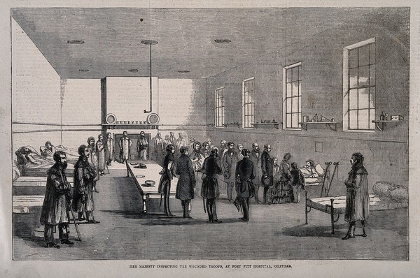 Queen Victoria with her entourage visiting invalided soldiers at Fort Pitt Hospital, Chatham. Wood engraving, 1855.