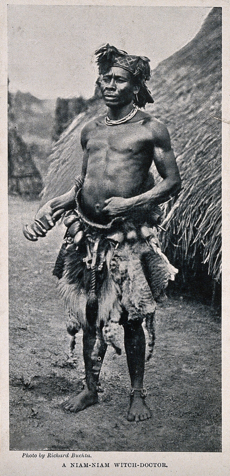A Niam-Niam medicine man or shaman, equatorial Africa. Halftone after R. Buchta., by Richard Buchta