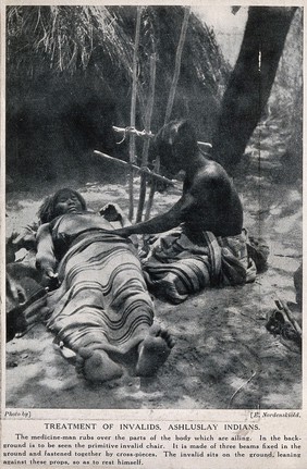 An Ashluslay Indian medicine man examining a sick patient, South America. Halftone after a photograph E. Nordenskiöld.