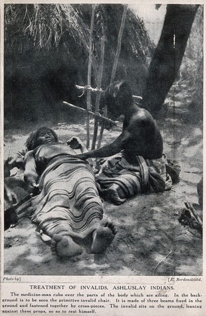 view An Ashluslay Indian medicine man examining a sick patient, South America. Halftone after a photograph E. Nordenskiöld.