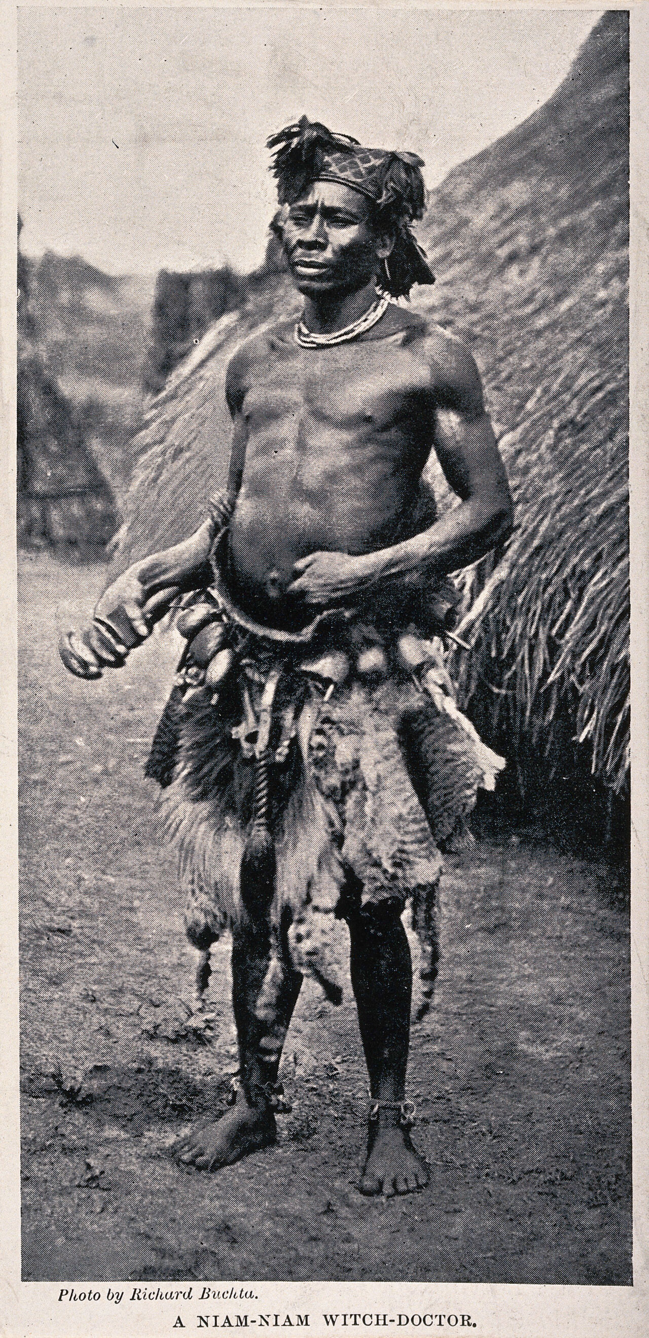 A Niam-Niam medicine man or shaman, equatorial Africa. Halftone after R. Buchta., by Richard Buchta