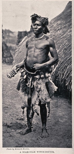 view A Niam-Niam medicine man or shaman, equatorial Africa. Halftone after R. Buchta.