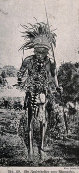 A Ntumbasee medicine man or shaman in full costume. Halftone.