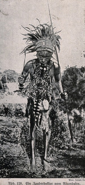 view A Ntumbasee medicine man or shaman in full costume. Halftone.