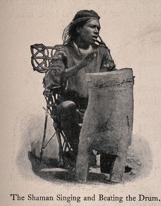 A shaman singing and beating a drum. Halftone.