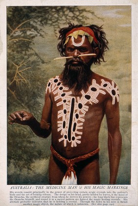 A shaman or medicine man with extensive body painting and nose stick, Australia. Colour process print.