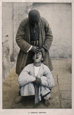 A Persian dentist extracting a tooth from a squatting patient. Halftone.