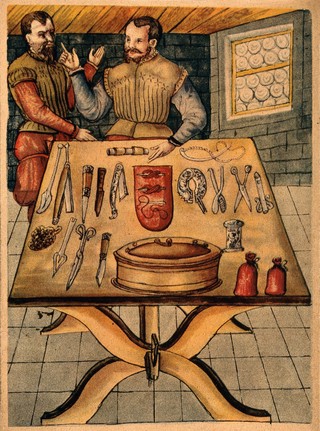 Surgical instruments laid out on a table, for use in cataract and hernia operations during the mid 1500s, with two men in 16th century dress standing behind it. Colour facsimile process print after a 16th century manuscript, 1925.