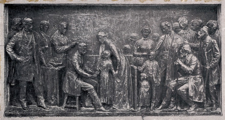 Louis Pasteur supervising the inoculation of a child against rabies. Process print after a bronze relief at the Pasteur Institute, Paris.