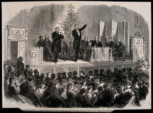 view A Christmas entertainment, presented in sign language for the deaf and dumb, at the Hanover Square rooms, London. Wood engraving, 1865.