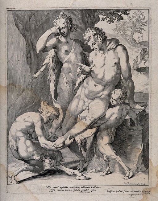 A satyr wearing eyeglasses, with young assistant, removes a thorn from the foot of a male faun who leans against female companion. Engraving by G. Piccini after S. Scolari.
