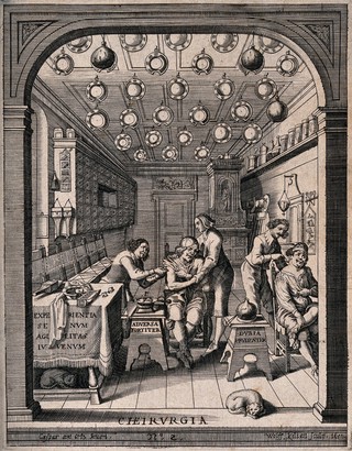 Two surgeons treating two seated male patients in a surgery, many surgeons' dishes are hanging from the ceiling. Line engraving by W. Kilian, 1652, after C. Ortz.