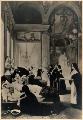 A hospital ward in the Comèdie Francaise set up during a war, doctors and nurses tend the soldiers. Photograph.