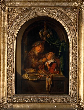 A man using a dental probe on a girl's mouth. Oil painting after Gerrit Dou.