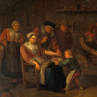 Interior of a surgery with a woman having blood let from the arm, a surgeon treating a man's injured foot, and other figures. Oil painting by Egbert van Heemskerck.