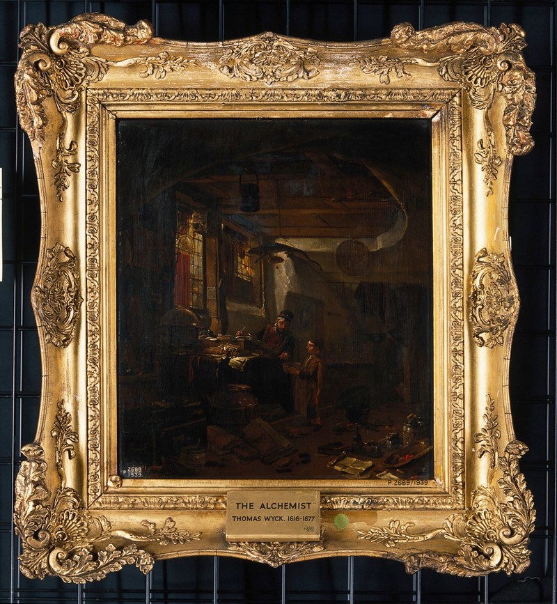 Interior with an alchemist examining a bowl brought by a boy. Oil painting by Thomas Wijck (Thomas Wyck)., by Thomas Wijck