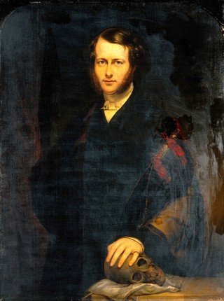 A man (George Dixon Longstaff?) wearing academic robes and holding a skull. Oil painting by Carl Schmid (?), 1835.