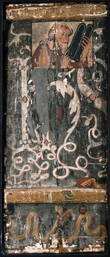 An evangelist (?) holding a book, head and shoulders to right; scrollwork forming the name of Jesus. Tempera painting by a Spanish painter, 14th century and oil painting by a Spanish painter, ca. 1600.