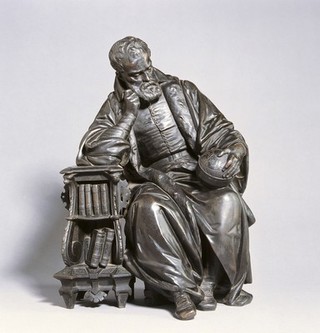 Galileo contemplating the globe. Bronze.