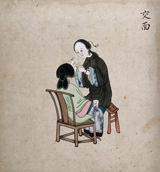 A standing woman preparing to remove facial hair from seated woman using a piece of string. Watercolour, China, 18--.