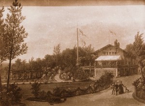 view Favourite home of Alexandre Brongniart, in Bézu St. Eloi, Eure; Brongniart depicted in the foreground, holding a walking stick and a hat. Photoprint.