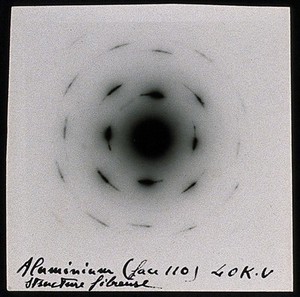 view Diffraction of electrons on microcrystallitic crystals or powders; aluminium. Photograph by J.J. Trillat.