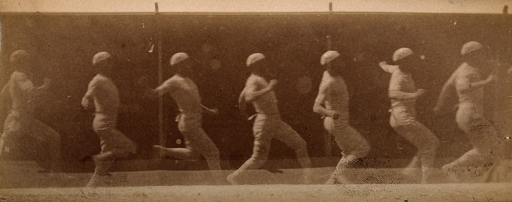 A man dressed in white, running; sequences. Photograph.