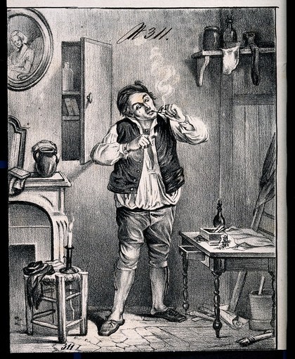 A young man smoking a pipe in his study. Lithograph, 19th century (?).