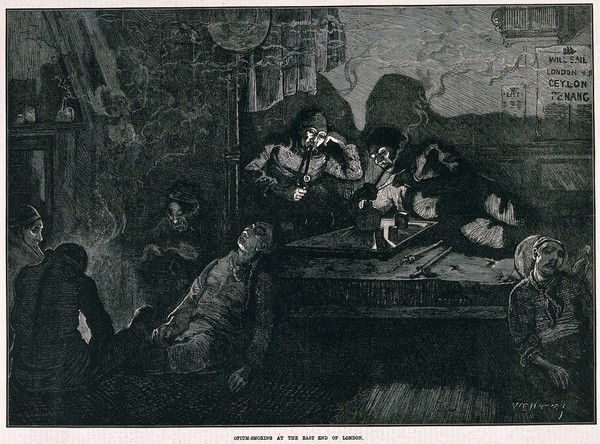 An opium den in London's East End with smokers lying on wooden bunks and slouching by the fire. Wood-engraving by W. B. Murray, c. 1880.