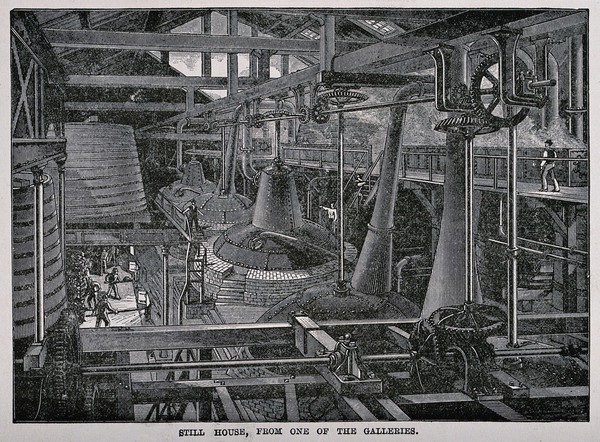 A still house in a whiskey distillery. Wood engraving, late 19th century.