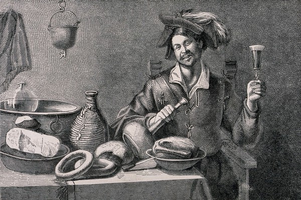 A man, glass in hand, sits at a table with food and drink. Wood-engraving, late 16th century.