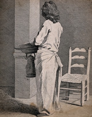 A barber with his back turned, standing by his chair. Etching by the Comte de Caylus, 1737, after E. Bouchardon.