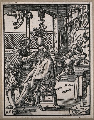 A barber cutting a man's hair. Woodcut by Jost Amman.