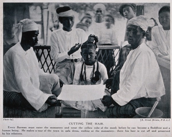 A barber cutting a boy's hair at a Buddhist monastery in Burma. Halftone after a photograph by R. Grant Brown.