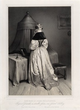 A woman seen from behind standing at her dressing table upon which is placed a powder puff and a mirror; behind is a bed with a canopy. Lithograph by F. Hanfstaengl after G. Ter Borch.