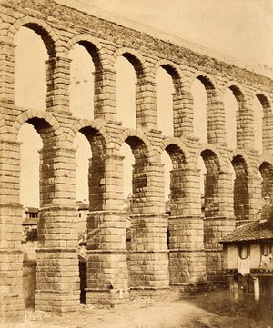 view The aqueduct at Segovia. Photograph by C. Clifford.