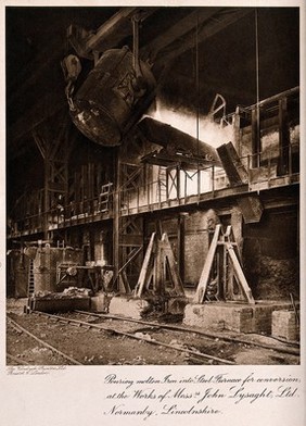 A furnace used in the processing of iron for the manufacture of steel. Photogravure.