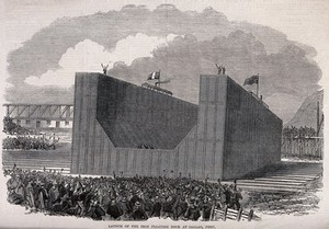 view Civil engineering: the launch of a floating dock in Peru. Wood engraving after T. E. Wilmot.