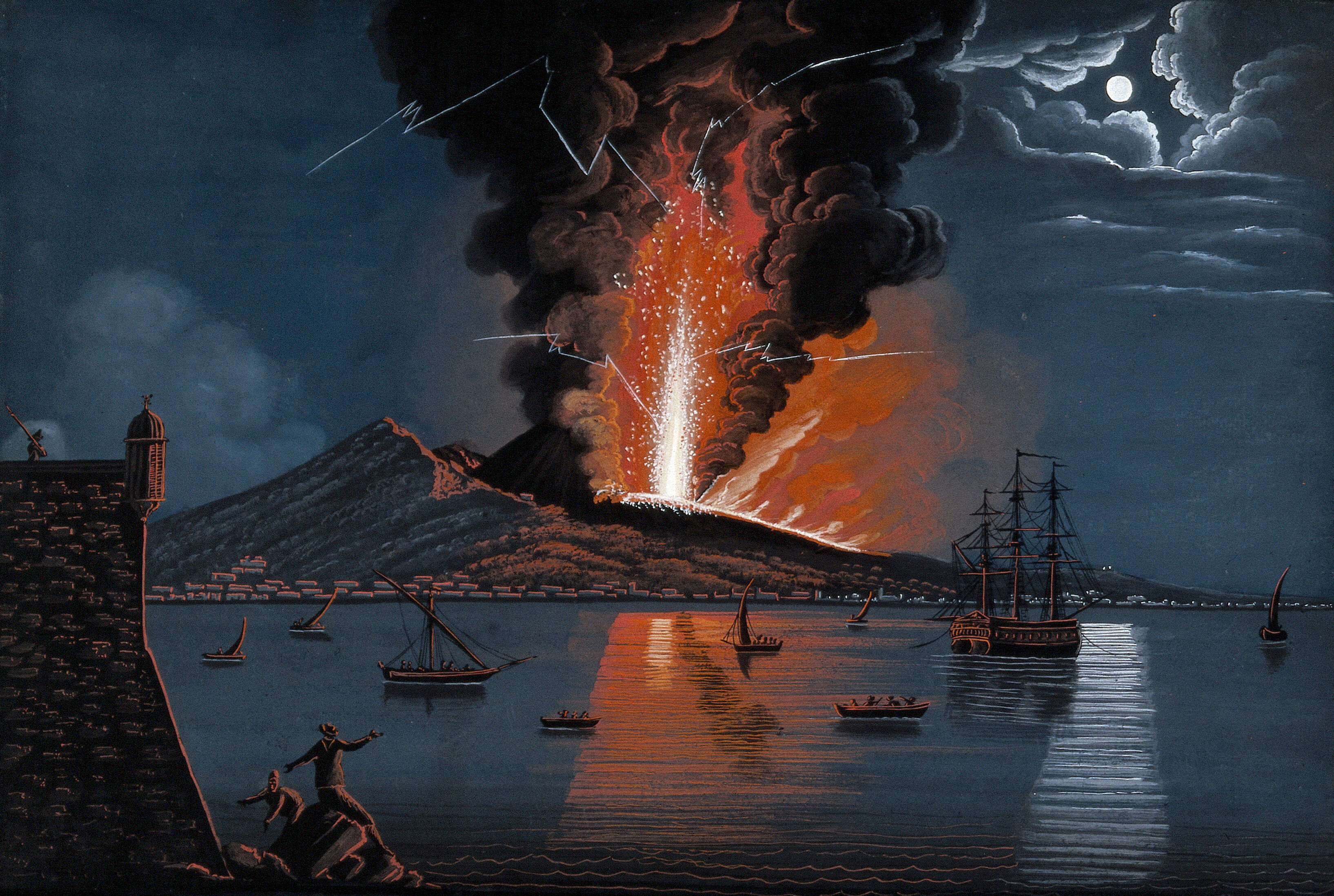 Mount Vesuvius erupting violently at night over the bay of Naples, with