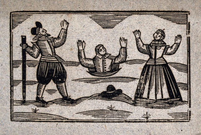 A man buried up to his waist holds his hands up above his head: a man and a woman stand on either side watching him in distress. Woodcut, 17--.